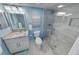 Bathroom featuring a glass-enclosed shower and granite vanity top at 3311 S Atlantic Ave # 801, Daytona Beach, FL 32118