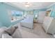 Inviting bedroom featuring a calm coastal color palette and ocean view at 3311 S Atlantic Ave # 801, Daytona Beach, FL 32118