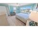 Light and airy bedroom with beautiful views and coastal decor elements at 3311 S Atlantic Ave # 801, Daytona Beach, FL 32118