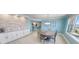 Open dining area with modern design and town views, seamlessly connected to the kitchen at 3311 S Atlantic Ave # 801, Daytona Beach, FL 32118