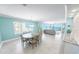 Open floor plan featuring dining area, living room with ocean views, and modern finishes at 3311 S Atlantic Ave # 801, Daytona Beach, FL 32118