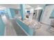 Bright modern kitchen with white cabinets, granite countertops, stainless appliances, and island with seating at 3311 S Atlantic Ave # 801, Daytona Beach, FL 32118