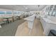 Bright kitchenette and dining area with ocean views from adjacent tables and chairs at 3311 S Atlantic Ave # 801, Daytona Beach, FL 32118