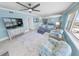 Comfortable living room with stylish decor and large windows showcasing panoramic city views at 3311 S Atlantic Ave # 801, Daytona Beach, FL 32118