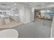 Relaxing lounge with kitchenette and library views, enhanced by natural light and ocean views at 3311 S Atlantic Ave # 801, Daytona Beach, FL 32118