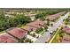 An aerial of a residential neighborhood showcases mature trees, manicured lawns and well-maintained homes at 3376 Leonardo Ln, New Smyrna Beach, FL 32168