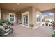A cozy porch with neutral toned flooring, comfortable seating, and ample natural light at 3376 Leonardo Ln, New Smyrna Beach, FL 32168