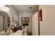 Bright bathroom with a vanity, commode, and a shower with a white curtain at 34 Richmond Dr, New Smyrna Beach, FL 32169