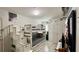 Bedroom featuring bunk beds with drawers and built-in ladder, and modern cabinetry at 34 Richmond Dr, New Smyrna Beach, FL 32169