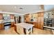 Gourmet kitchen featuring custom cabinets, stainless steel appliances, a large island, and marble countertops at 34 Richmond Dr, New Smyrna Beach, FL 32169