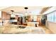 Spacious open kitchen features a large island, wine fridge and stainless steel appliances at 34 Richmond Dr, New Smyrna Beach, FL 32169