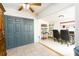 A bonus room with tile floors and an adjacent office area with a window and ceiling fan at 35 Knollwood Estates Dr, Ormond Beach, FL 32174
