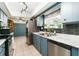 Modern kitchen features stainless steel appliances, granite countertops, and stylish cabinets at 35 Knollwood Estates Dr, Ormond Beach, FL 32174