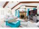 Inviting living room features a stone fireplace and comfortable seating at 35 Knollwood Estates Dr, Ormond Beach, FL 32174
