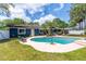 Backyard oasis features a private pool with a spacious patio area, ideal for outdoor entertaining at 35 Knollwood Estates Dr, Ormond Beach, FL 32174