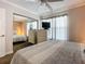 Serene bedroom with mirrored closet and soft natural light at 4225 S Atlantic Ave # 218, New Smyrna Beach, FL 32169