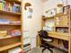 Functional home office with built-in shelving and a cozy workspace at 4225 S Atlantic Ave # 218, New Smyrna Beach, FL 32169