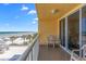 Balcony view offering serene vistas of the ocean and direct beach access at 425 S Atlantic Ave # 302, New Smyrna Beach, FL 32169