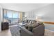 Bright living room featuring ocean views, comfortable seating, and stylish decor at 425 S Atlantic Ave # 302, New Smyrna Beach, FL 32169