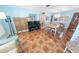 This dining room features a unique chandelier and ample natural light at 4350 Candlewood Ln, Ponce Inlet, FL 32127