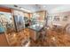 Modern kitchen boasts stainless steel appliances, granite countertops, and tiled floors at 4350 Candlewood Ln, Ponce Inlet, FL 32127