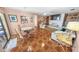Cozy living area with a fireplace, TV, and access to the dining room and outdoor area at 4350 Candlewood Ln, Ponce Inlet, FL 32127