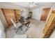 Office space featuring a desk, rolling chair, and shelving at 4350 Candlewood Ln, Ponce Inlet, FL 32127