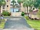 Well-maintained community features lush landscaping and views of the waterway at 439 Bouchelle Dr # 202, New Smyrna Beach, FL 32169