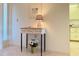 Inviting entryway with stylish console table and decorative accents at 460 Bouchelle Dr # 104, New Smyrna Beach, FL 32169