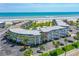 Exterior of the condos, showcasing ocean views, private balconies, and convenient beach access at 4841 Saxon Dr # C201, New Smyrna Beach, FL 32169