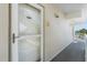 Image shows the front door to the condo with the unit number and well-maintained exterior at 4841 Saxon Dr # C201, New Smyrna Beach, FL 32169