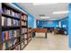 Enjoy the comfort of a lounge and library with books, games, foosball, sofas and a TV at 4841 Saxon Dr # C201, New Smyrna Beach, FL 32169