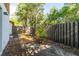 Fenced-in backyard with a concrete patio offering privacy and a secure outdoor area at 5 Soco Trl, Ormond Beach, FL 32174