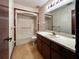 Bathroom with a shower-tub combo and a vanity, providing a functional and convenient space at 5 Soco Trl, Ormond Beach, FL 32174