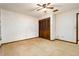 Bedroom with ceiling fan and closet providing ample storage solutions for organized living at 5 Soco Trl, Ormond Beach, FL 32174