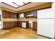 Bright kitchen featuring ample cabinet space, basic appliances, and a bright window at 5 Soco Trl, Ormond Beach, FL 32174