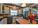 Charming kitchen with farmhouse sink, butcher block island, and brick backsplash at 508 Faulkner St, New Smyrna Beach, FL 32168