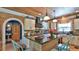 Well-appointed kitchen with stainless steel appliances, brick island, and modern finishes at 508 Faulkner St, New Smyrna Beach, FL 32168