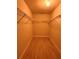 Walk-in closet with hardwood flooring and metal shelving for lots of storage at 519 Aeolian Dr, New Smyrna Beach, FL 32168