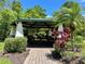 Enjoy this lovely gazebo surrounded by a lush landscape and providing a tranquil retreat at 519 Aeolian Dr, New Smyrna Beach, FL 32168