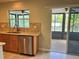 Kitchen featuring stainless steel appliances and backyard views at 519 Aeolian Dr, New Smyrna Beach, FL 32168