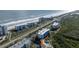 Stunning aerial view of beachside condos with ocean views and a community pool at 5300 S Atlantic Ave # 17-207, New Smyrna Beach, FL 32169