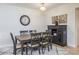 Cozy dining room with stylish furnishings including a gray dining set and decorative accents at 5300 S Atlantic Ave # 17-207, New Smyrna Beach, FL 32169