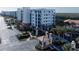 Gated condo building entrance showcasing lush landscaping and well maintained grounds at 5300 S Atlantic Ave # 17-207, New Smyrna Beach, FL 32169