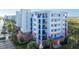 Beautiful condo building featuring multiple balconies and unique coastal architectural design at 5300 S Atlantic Ave # 17-207, New Smyrna Beach, FL 32169