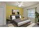 Vibrant bedroom featuring a unique color scheme, ample natural light, and cozy furnishings at 5300 S Atlantic Ave # 19-403, New Smyrna Beach, FL 32169