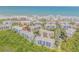 Aerial view showcasing the beautiful beachside community surrounded by lush greenery and ocean views at 5300 S Atlantic Ave # 9-206, New Smyrna Beach, FL 32169