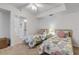 Bright bedroom with two beds and a bathroom behind it at 5300 S Atlantic Ave # 9-206, New Smyrna Beach, FL 32169