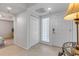 Bright foyer with tile flooring, closet, and glass block window feature at 5300 S Atlantic Ave # 9-206, New Smyrna Beach, FL 32169
