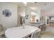 Bright dining area adjacent to the kitchen, featuring a white table and seating for four at 5430 Dubois Ave, Port Orange, FL 32127